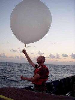 Darek Baranowski launches a radiosonde from the Revelle